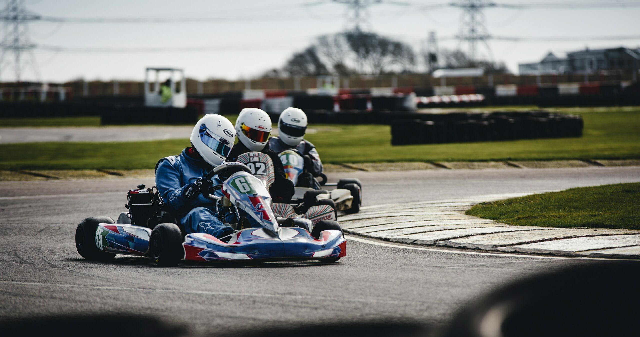 Stock Image - 3 Go Karts rounding a corner