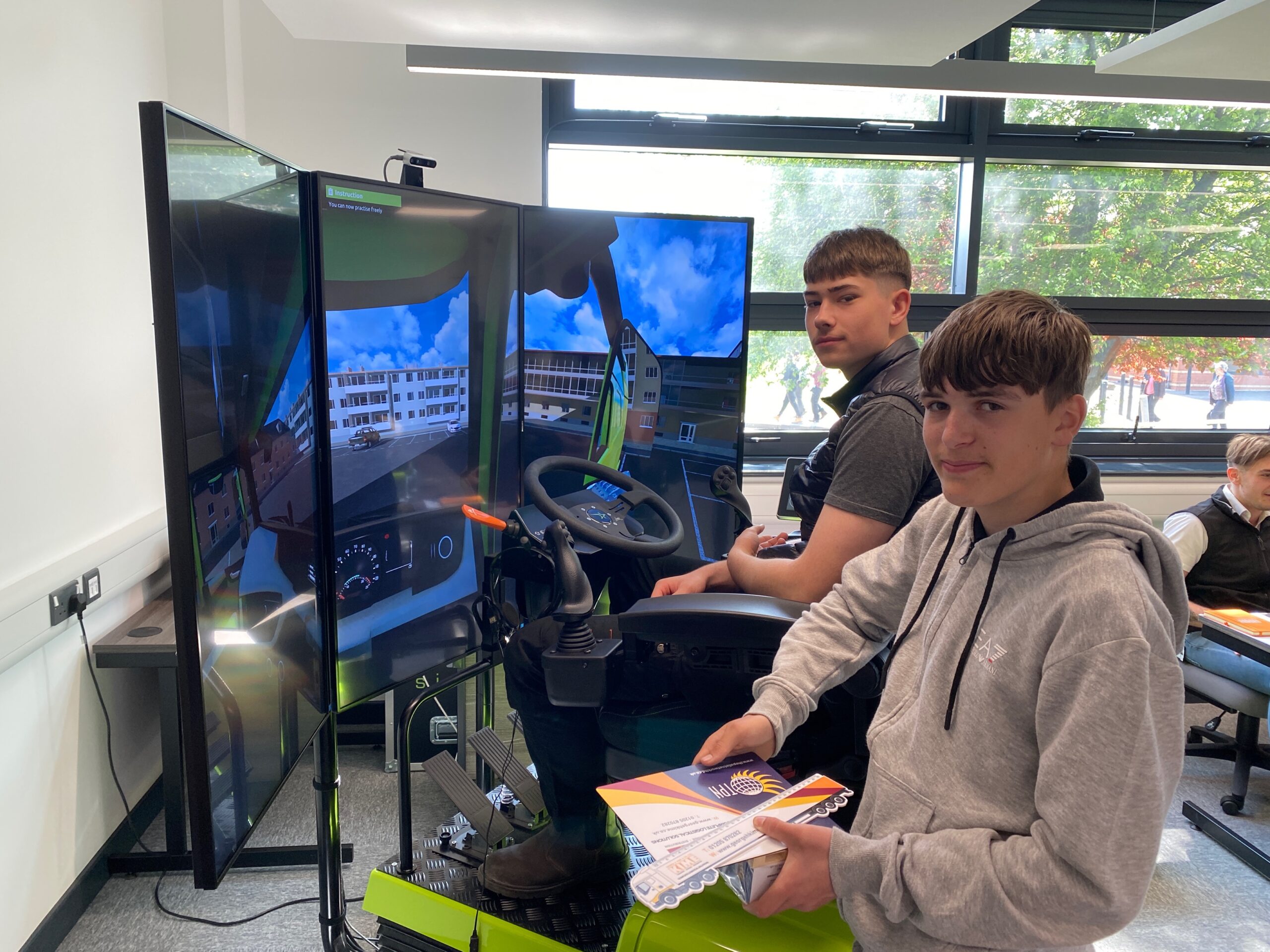 Boston College learners trying out the driving simulator as part of the Transport and Logistics Career Day