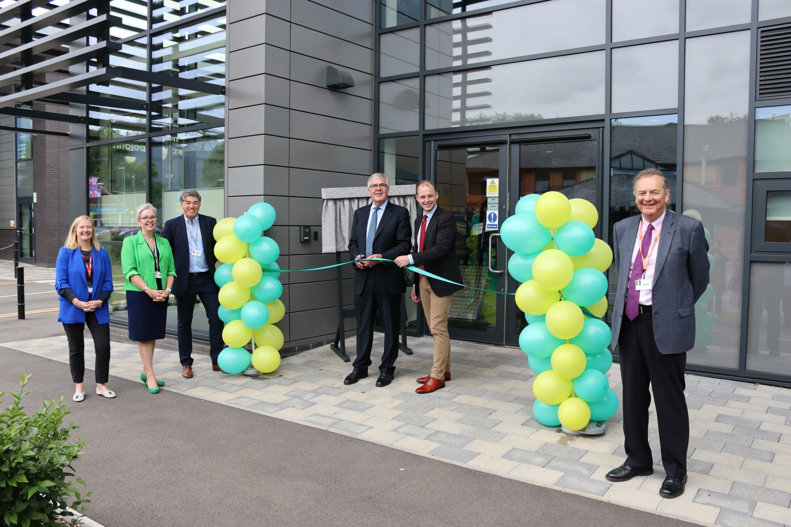 Official ribbon cutting at Boston College's official opening for the Digital, Transport and Logistic Academy