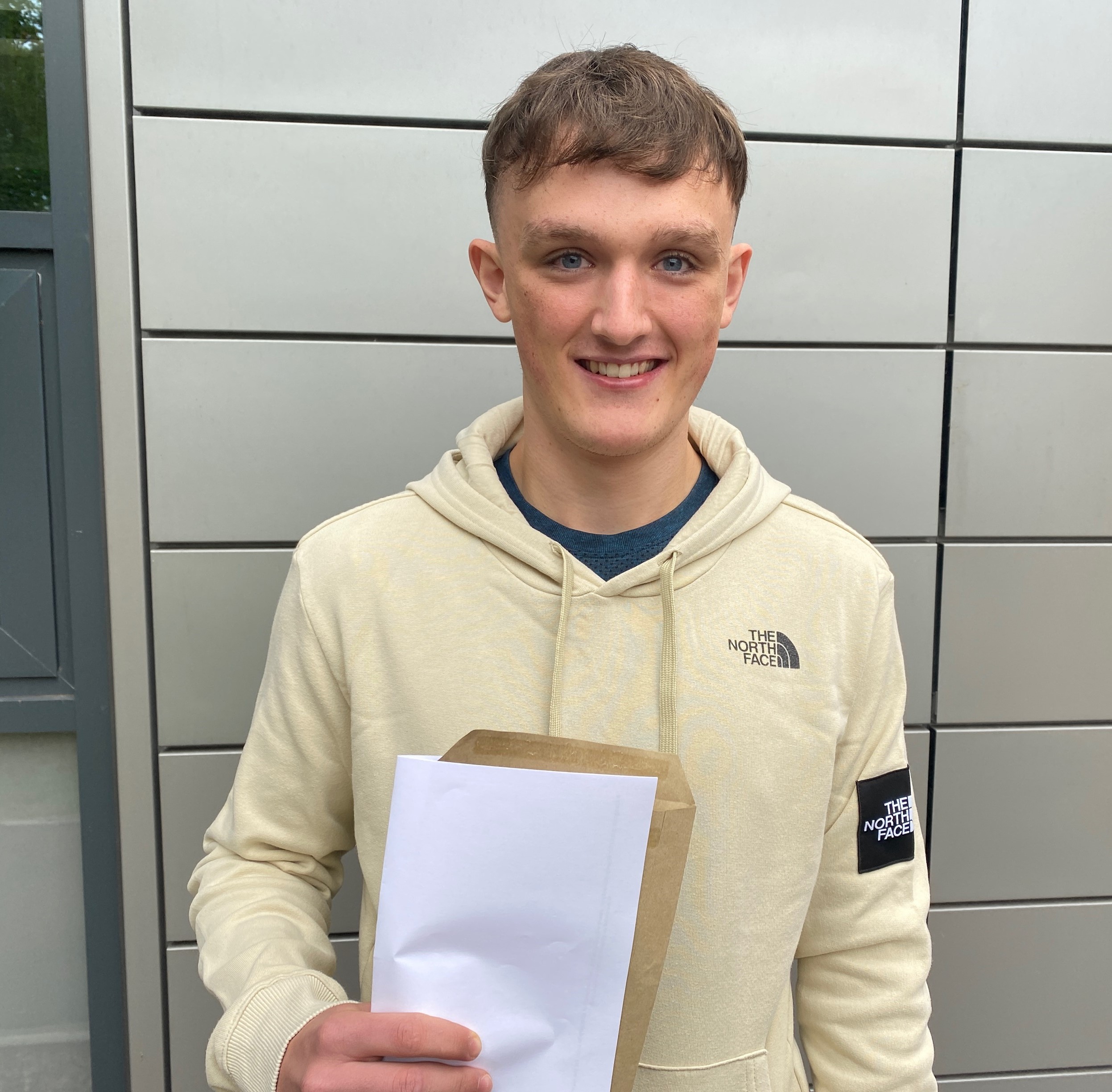 Happy A Levels Learner with results