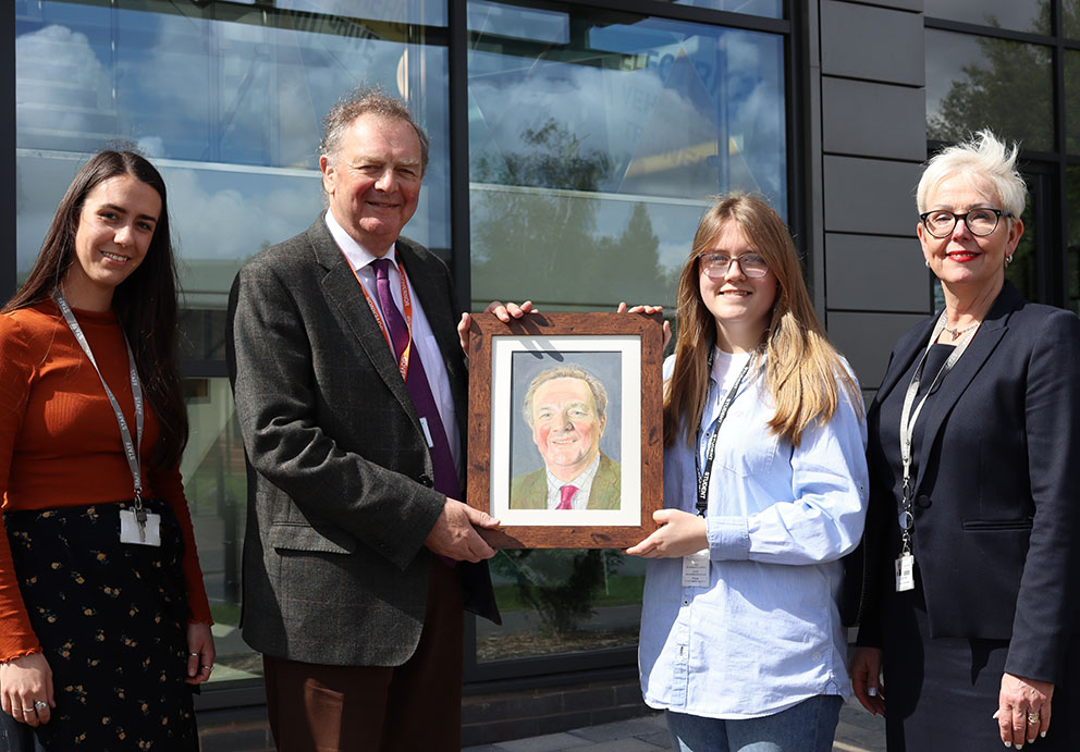 Peter Cropley, Chair of Governors receiving his retirement gift of a portrait from Lv3 Art and Design Learner. Picture also is Senior Learning Lead for Art and Design, and Boston College Principal