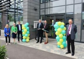 Official ribbon cutting at Boston College's official opening for the Digital, Transport and Logistic Academy