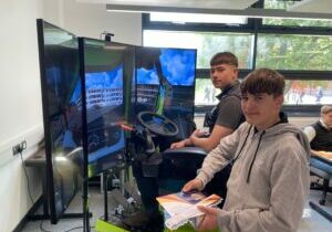 Boston College learners trying out the driving simulator as part of the Transport and Logistics Career Day